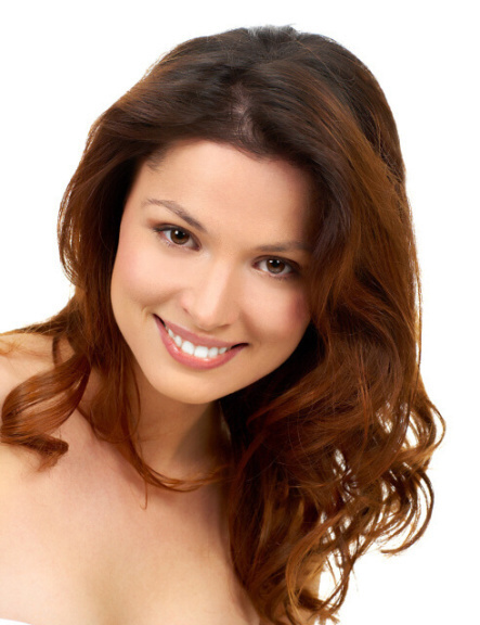 Beautiful young woman smiling. Isolated over white  background.