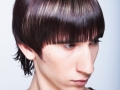 Cute young guy with fashion haircut