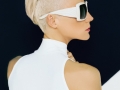 Blonde model in trendy sunglasses with stylish Haircut. Fashion photo